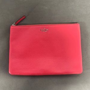 Bright pink Kate spade pouch